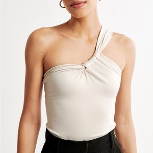 Sleek Seamless Fabric One-Shoulder Twist Top: Beige
